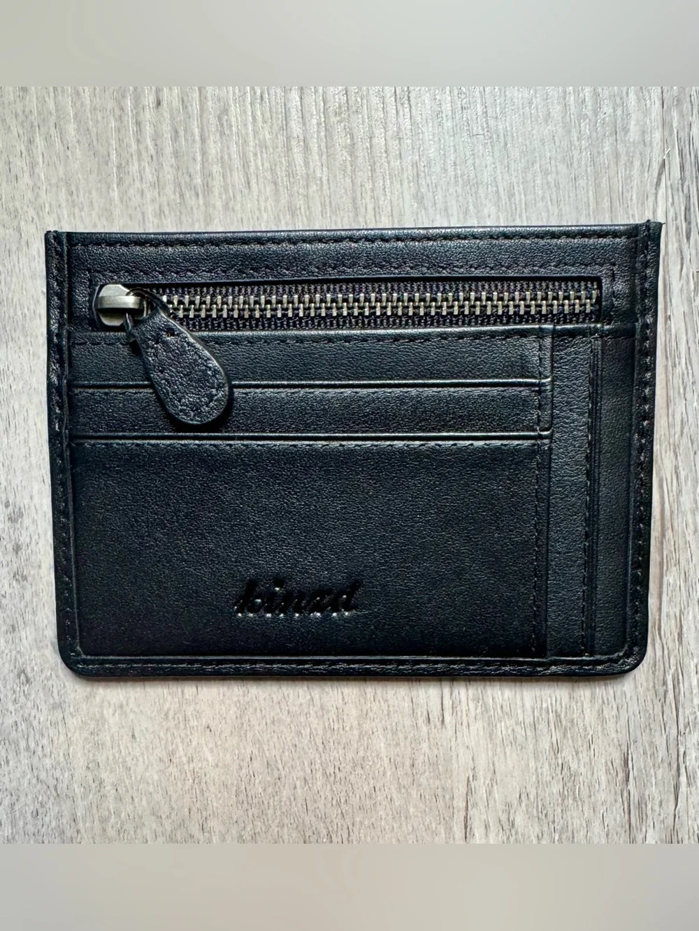 Kinzd minimalist leather card holder by Kinzd, featuring a zippered compartment